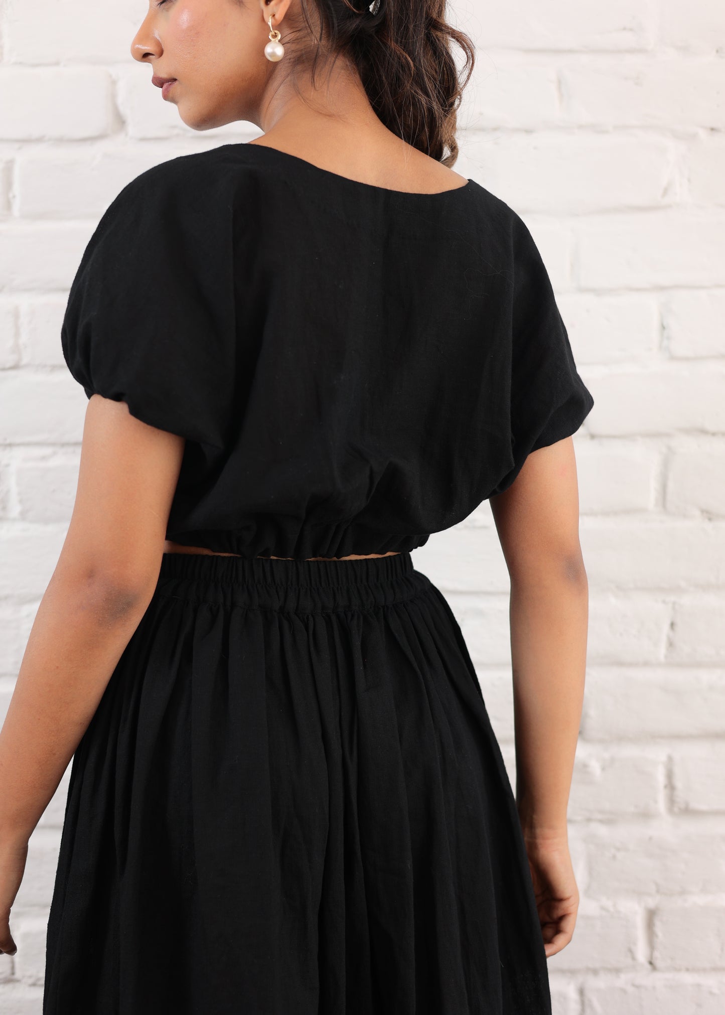 Black slit skirt with waist crop top