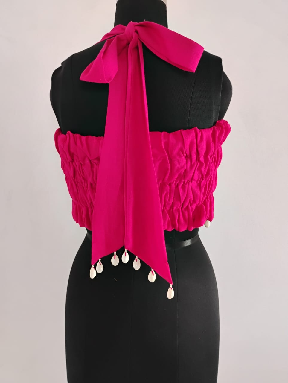 Pink bandeau top with sea shell