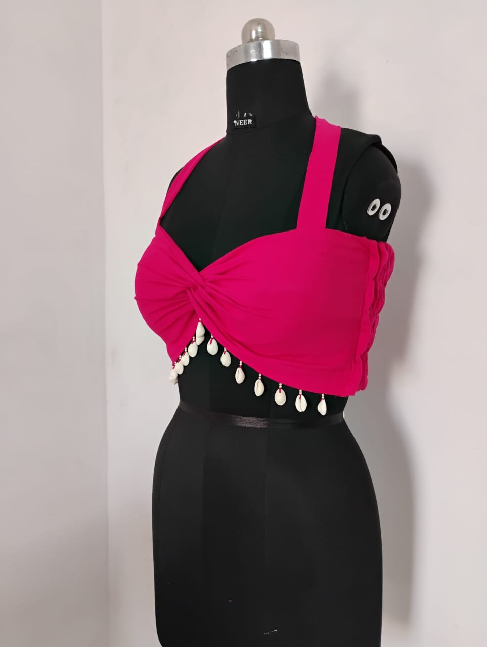 Pink bandeau top with sea shell