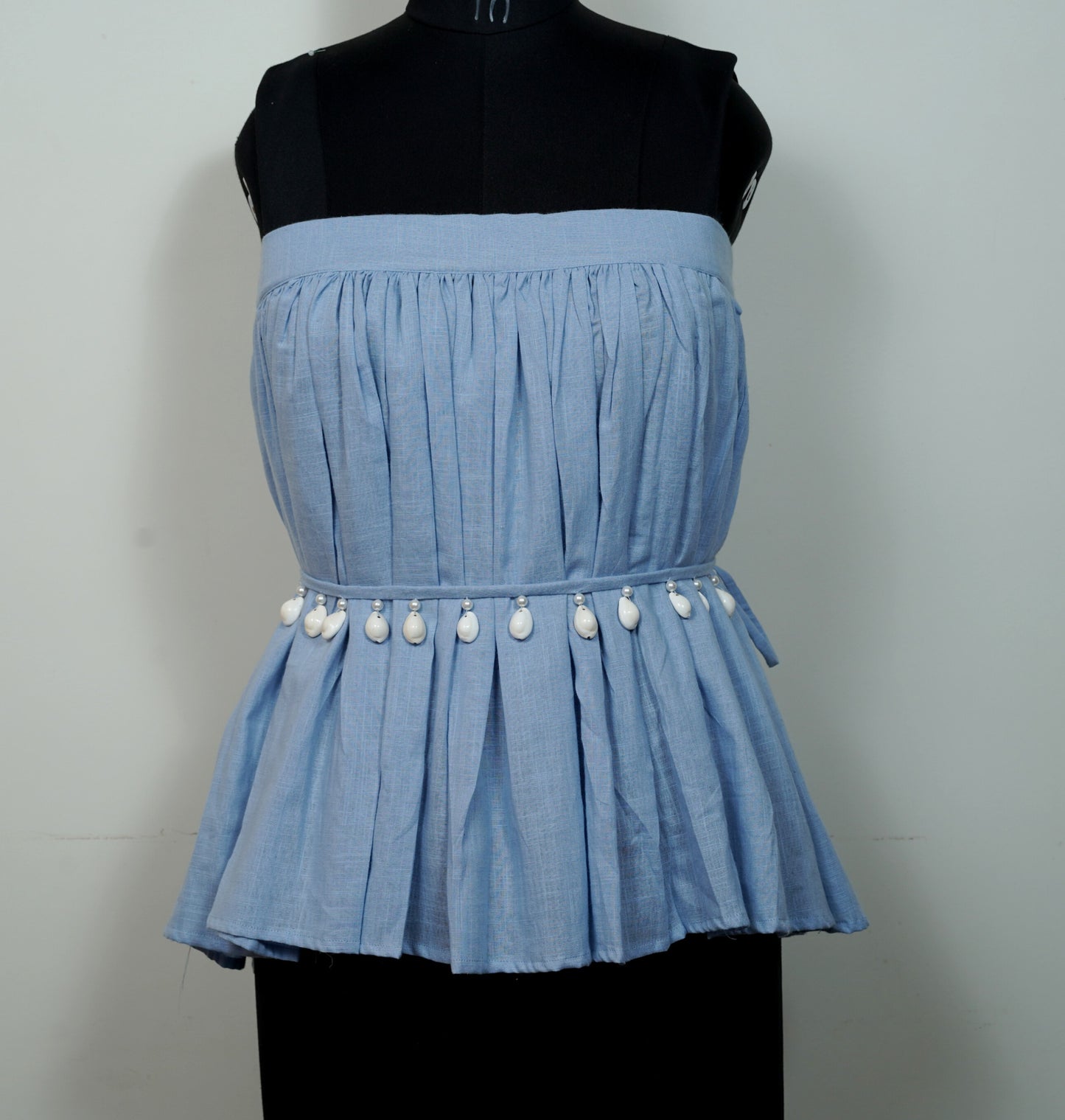 Blue off shoulder plates top with shell belt